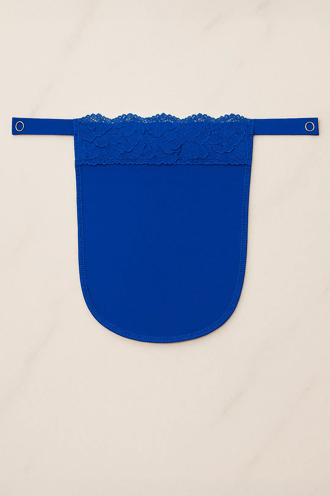 Royal blue lace mocker modesty panel in flatlay view, showcasing intricate floral lace design and secure clip fastening for deep-neck coverage — Muselot.