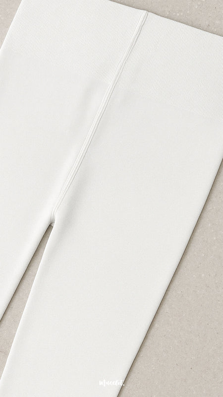 A close-up of non-slip waistband white opaque tights, highlighting secure fit, reinforced stitching, and premium comfort design - Muselot