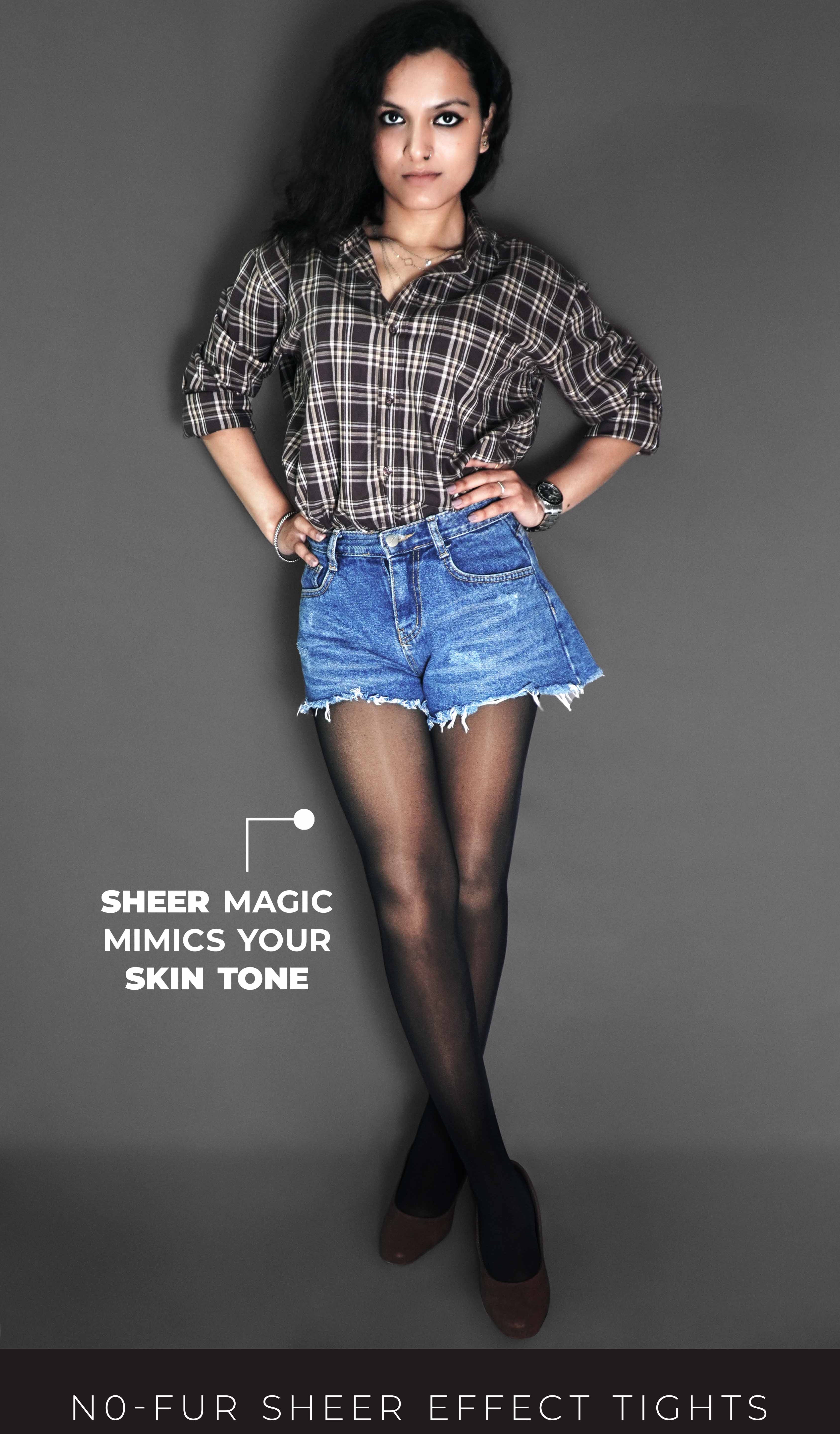 A model wearing black sheer tights for women, posing with her hands on her waist, showcasing the smooth transparent material-Muselot