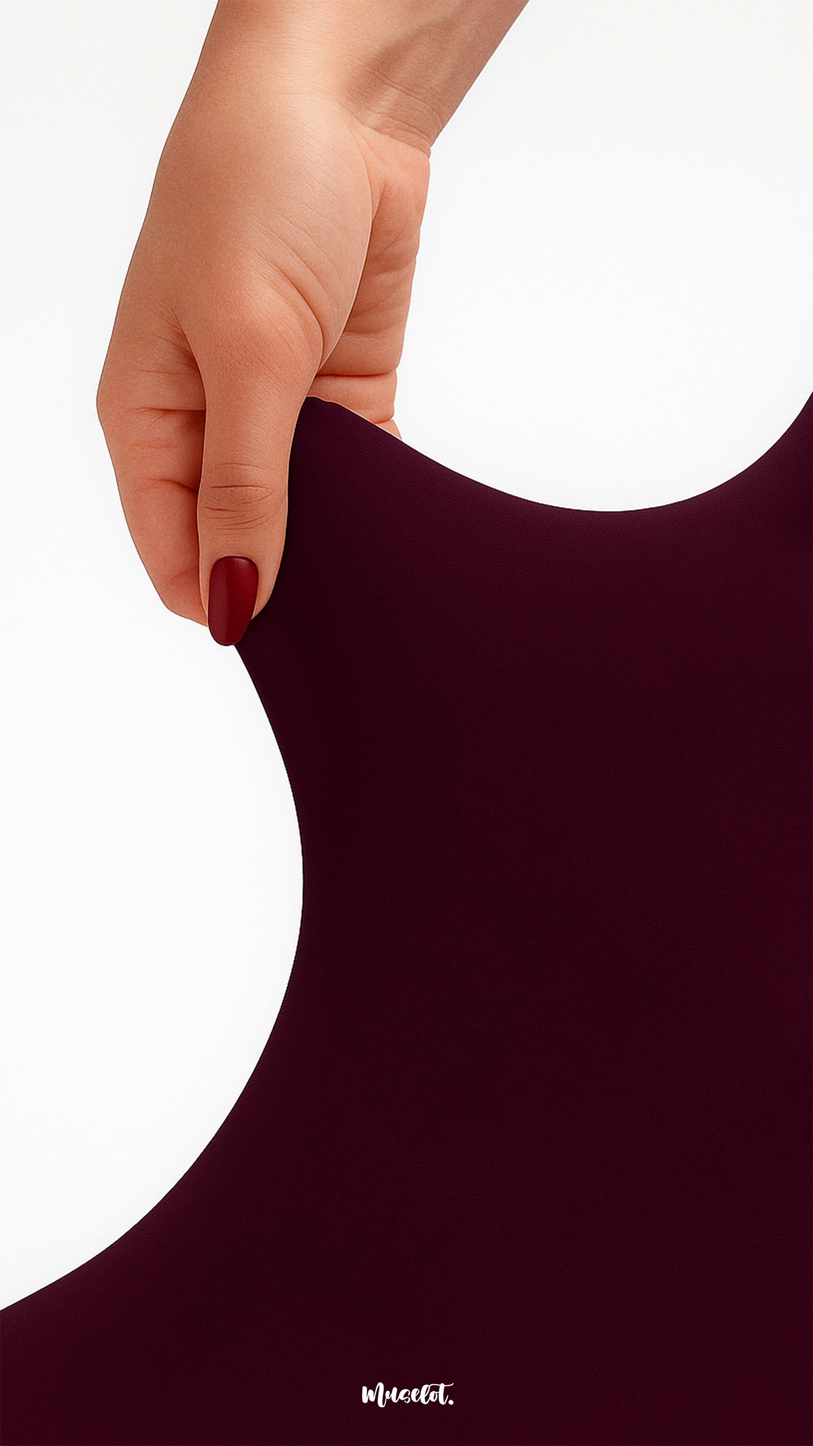 Close-up of hand stretching durable semi-opaque maroon tights, showcasing high elasticity, strength, and tear-proof quality - Muselot