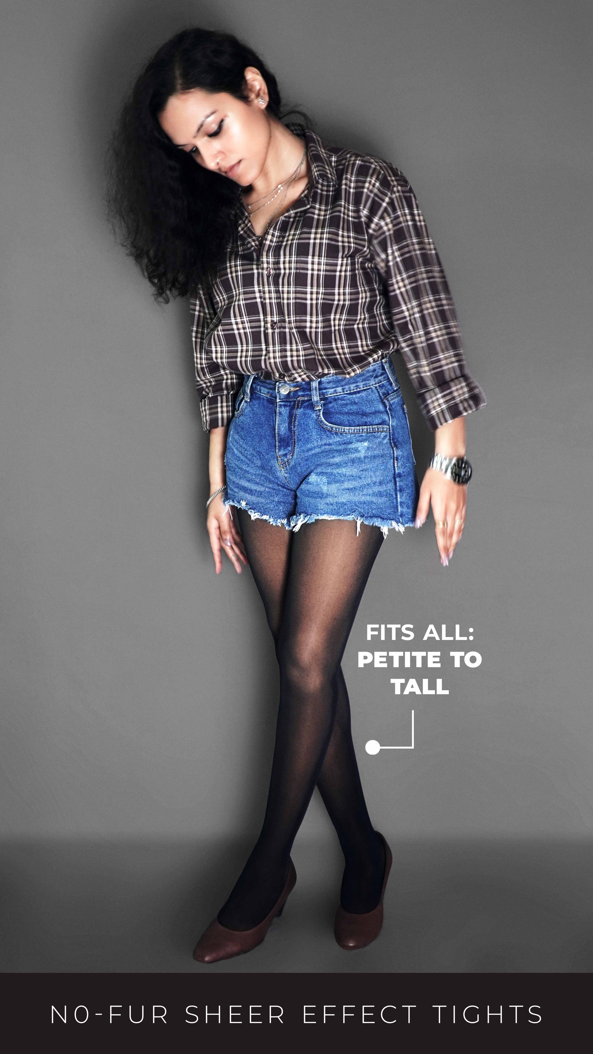 A woman wearing skin lined sheer stockings, paired with a denim shorts and brown heels, she is looking downward at her tights, highlighting the durable smooth material-Muselot