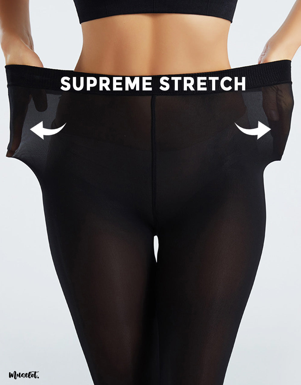 A model showcasing the supreme stretch capability of black stockings by stretching them wide without tearing, demonstrating their highly stretchable material - Muselot