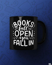 Printed black mugs online for book lovers printed with Books fall open, you fall in  - MUSELOT