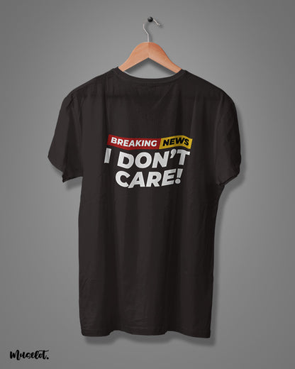 Breaking news I don't care printed t shirts for men and women in black colour