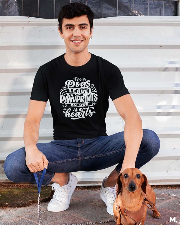 Dogs leave pawprints on our heart black printed t shirts for dog lovers at Muselot