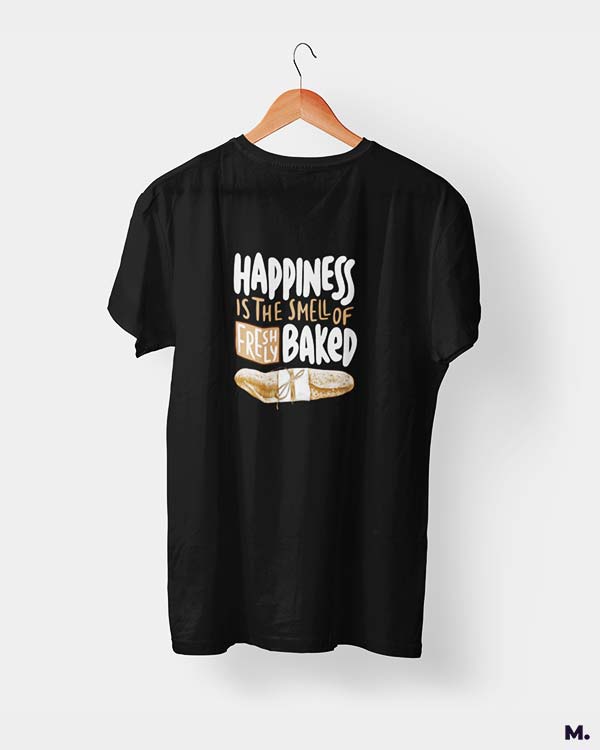 Black t shirt printed with Happiness is smell of freshly baked bread for baking lovers.