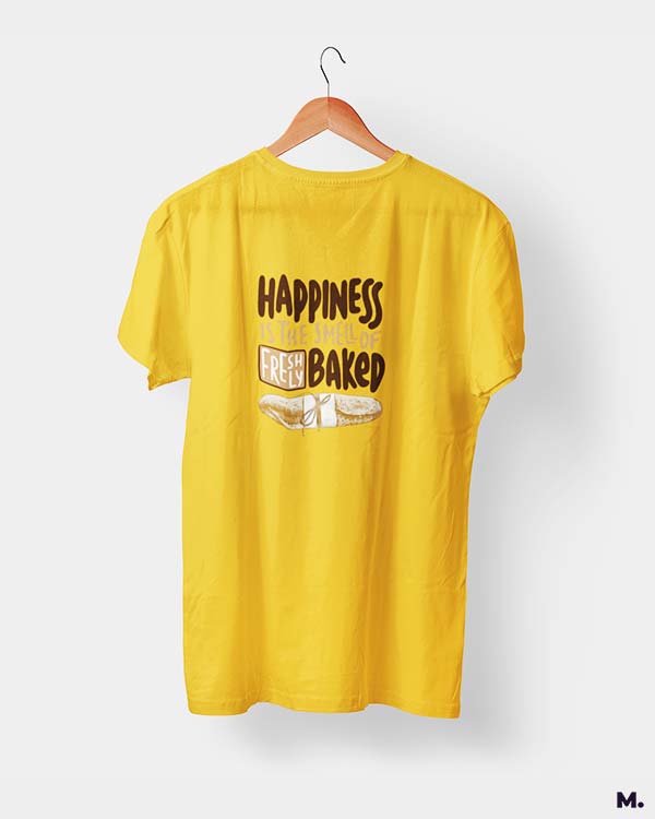 Golden yellow t shirt printed with Happiness is smell of freshly baked bread for baking lovers.