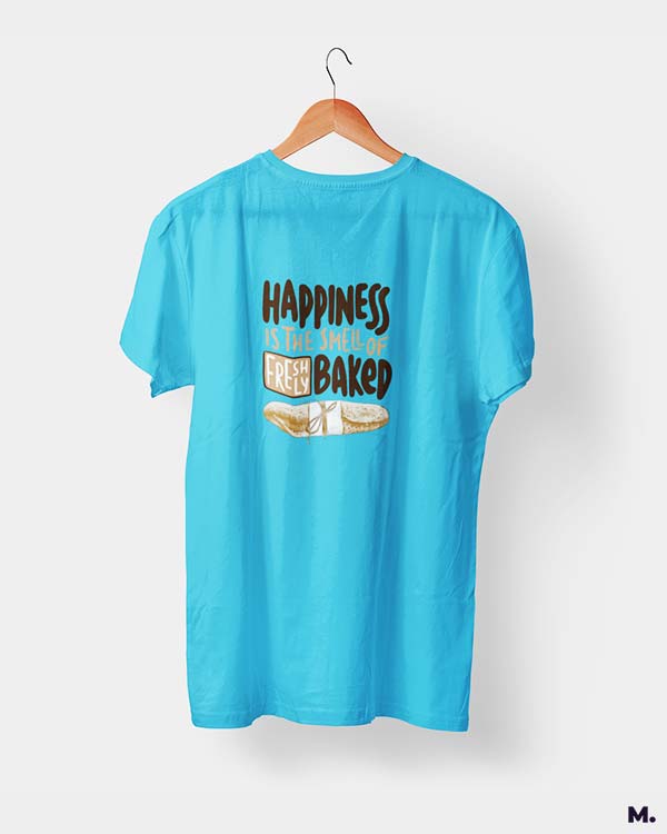 Sky blue t shirt printed with Happiness is smell of freshly baked bread for baking lovers.