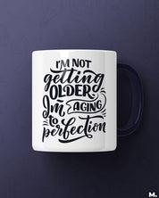 White Printed mugs online for moms - I am aging to perfection  - MUSELOT