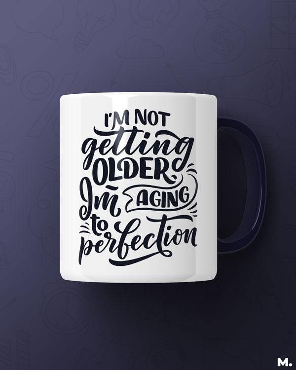  White Printed mugs online for moms - I am aging to perfection  - MUSELOT