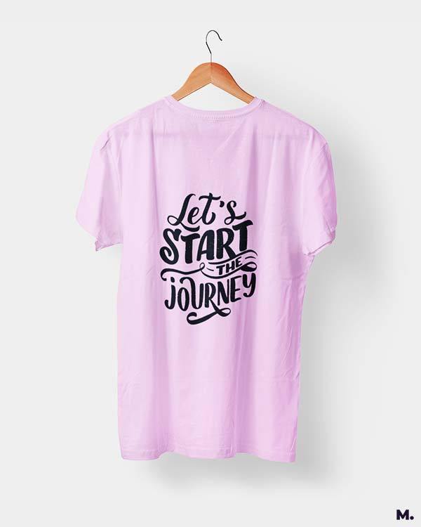 Muselot's unisex t-shirt in light pink printed with let's start the journey for travel enthusiasts.