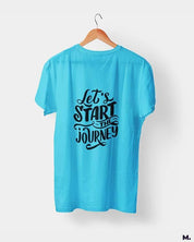 Muselot's unisex t-shirt in sky blue printed with let's start the journey for travel enthusiasts.