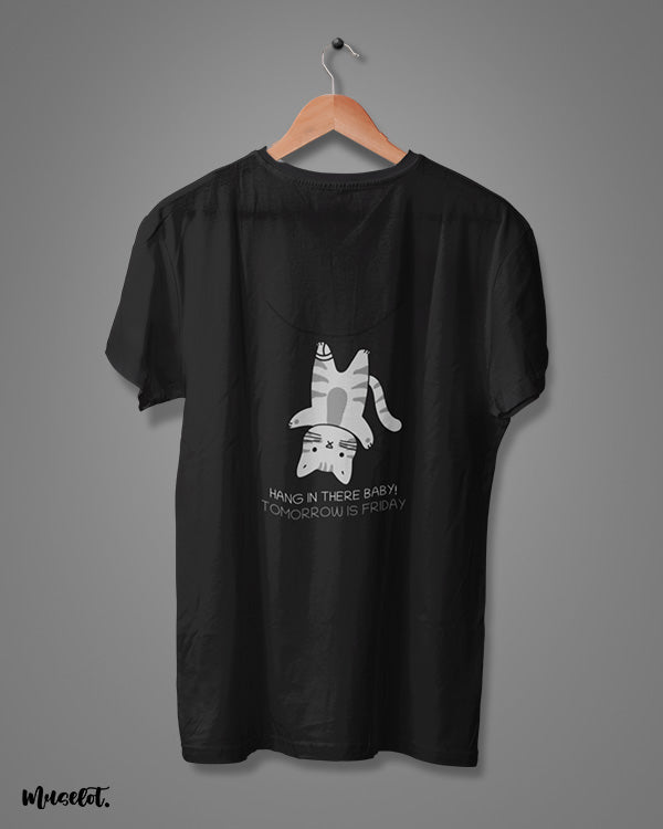 Hang in there baby, tomorrow is friday funny design illustrated graphic t shirt in black at Muselot