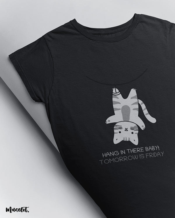 Hang in there baby, tomorrow is friday funny design illustrated graphic t shirt in black at Muselot