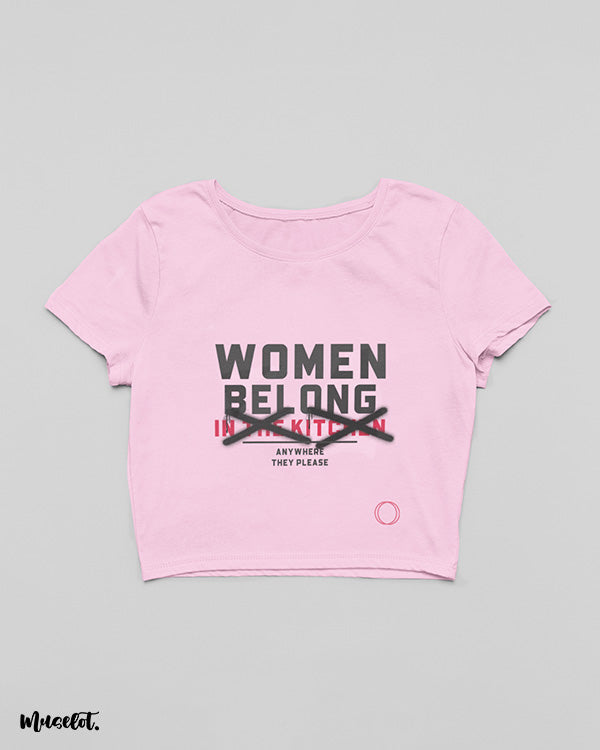 Women belong anywhere they please and not in the kitchen design illustrated graphic crop t shirts in light pink colour to support women empowerment at Muselot