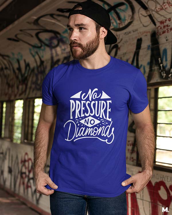Model wearing Royal blue t-shirt printed with "no pressure, no diamonds" which is a famous quote by Thomas Carlyle.