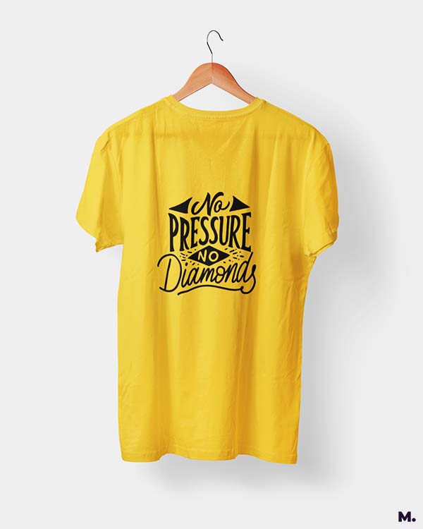 Muselot's yellow t-shirt printed with "no pressure, no diamonds" which is a famous quote by Thomas Carlyle.