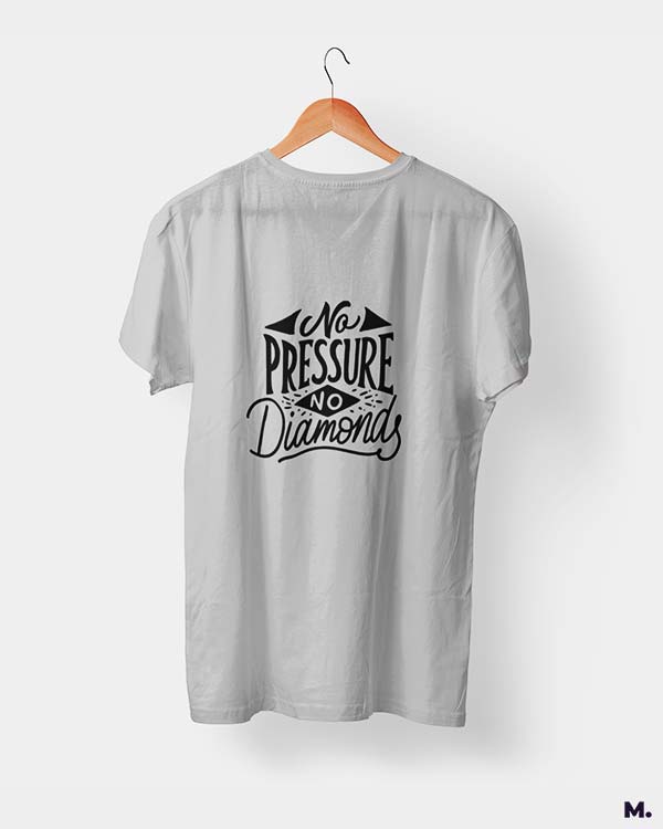 Muselot's grey t-shirt printed with "no pressure, no diamonds" which is a famous quote by Thomas Carlyle.