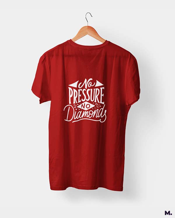 Muselot's red t-shirt printed with "no pressure, no diamonds" which is a famous quote by Thomas Carlyle.