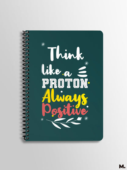 Spiral notebooks printed with motivational quote "think like a proton, always positive" - Muselot